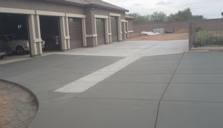 New nine car garage build with footings, stem, and flatwork complete with valley gutter in Surprise, AZ.